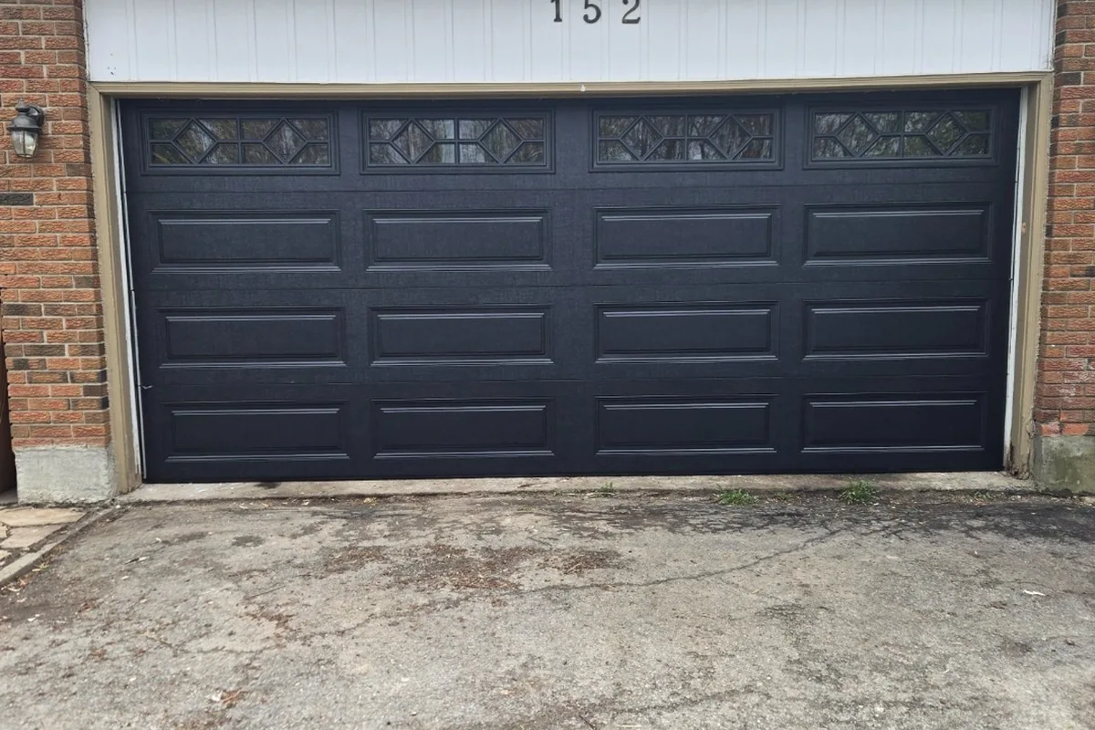 Modern Nepean home with a charcoal insulated double garage door